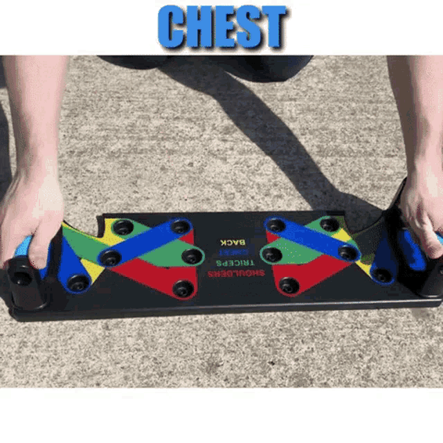 a person is doing push ups on a push up board with the word chest above them