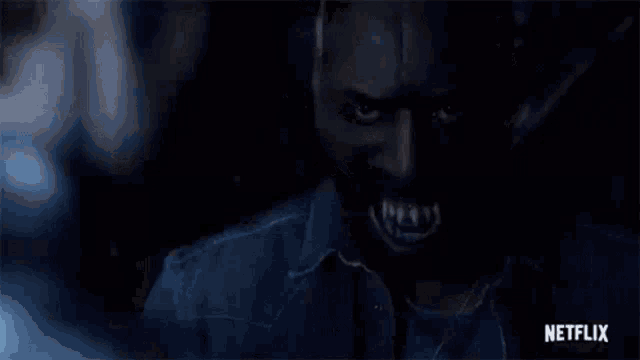 a man is being attacked by a zombie in a netflix trailer .