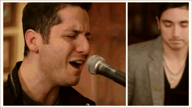 a man singing into a microphone next to another man playing a piano