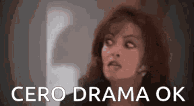 a woman is looking up with the words cero drama ok in the background