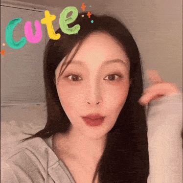 a woman with the word cute written on her face