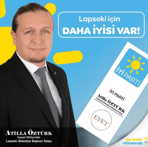 a man in a suit and tie holds a pamphlet that says iyi parti