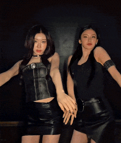 two women are standing next to each other with their arms crossed and the word pu is on the bottom of the picture