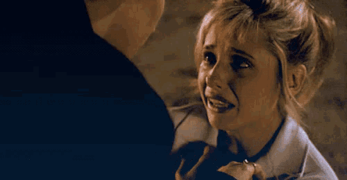 a woman says " i love you so much " while looking at a man