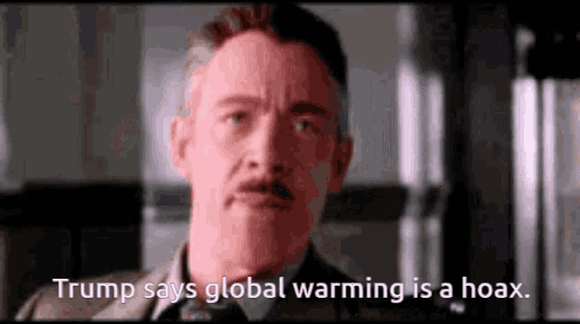 a man with a mustache is talking about global warming