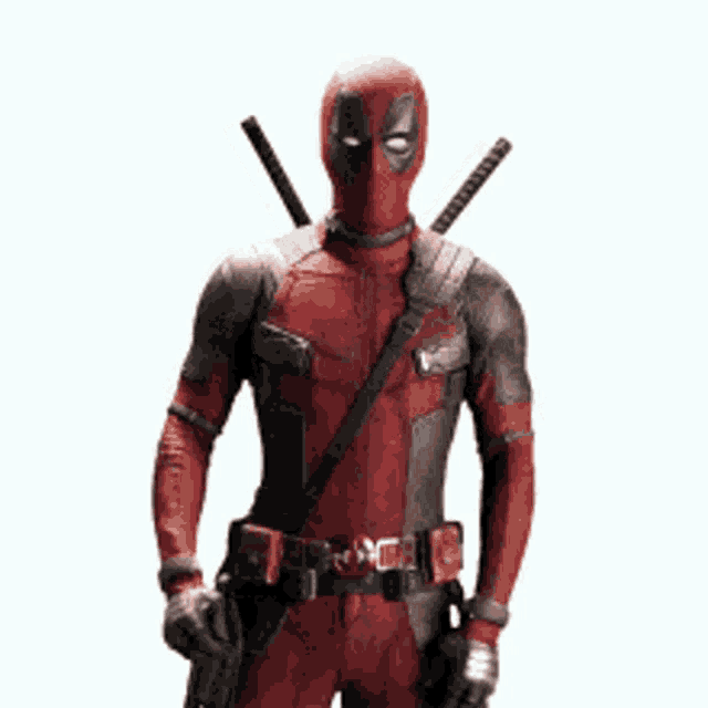 deadpool is wearing a red and black superhero costume and holding a gun .