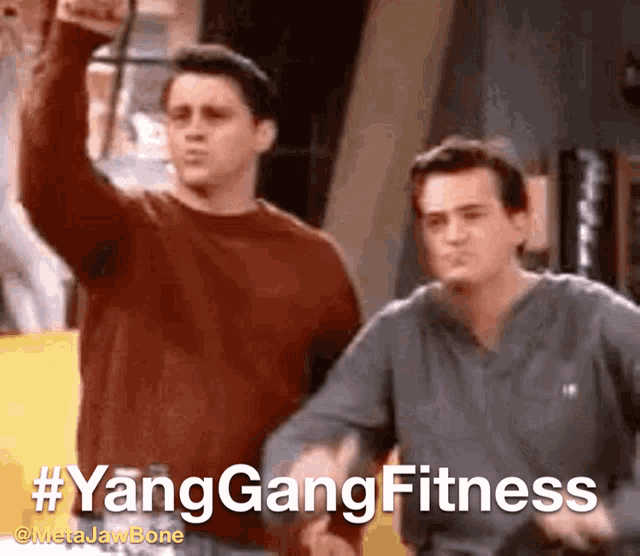 two men standing next to each other with #yanggangfitness written on the screen