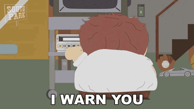 a cartoon character says i warn you in front of a sign that says south park