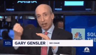 a man in a suit and tie with the name gary gensler on the bottom