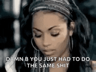 a woman wearing a headband and hoop earrings is talking about something .