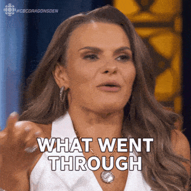 a woman says " what went through " while wearing a white shirt