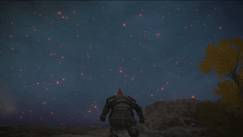 a man in armor stands in front of a night sky full of stars