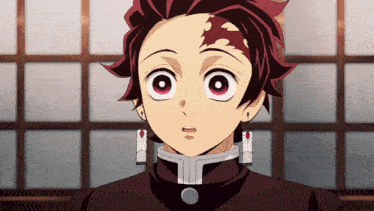 a close up of a anime character 's face