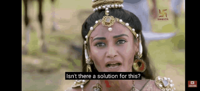 a woman with a crown on her head says isn 't there a solution for this .