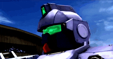 a close up of a robot 's head with green lights on