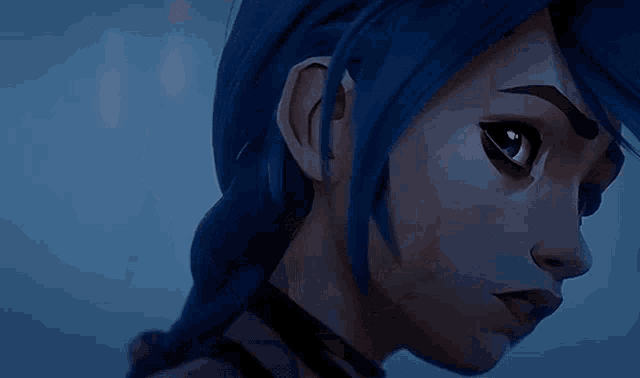 a close up of a cartoon character 's face with blue hair