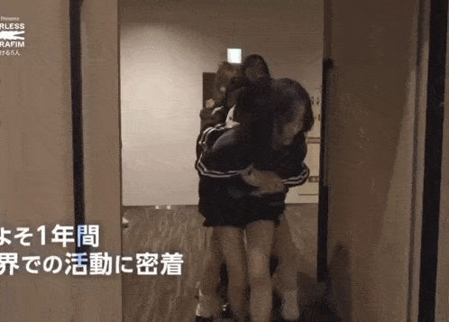 a person is carrying another person on their back and the words " presents " are on the wall