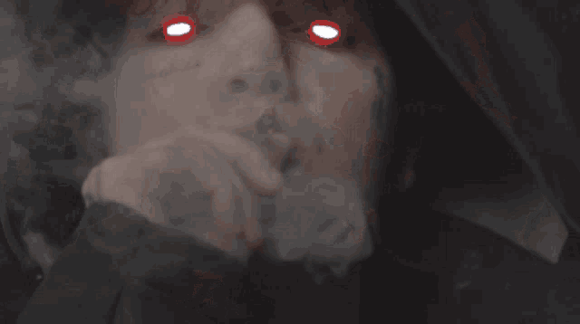a close up of a person 's face with a tattoo that says graphic