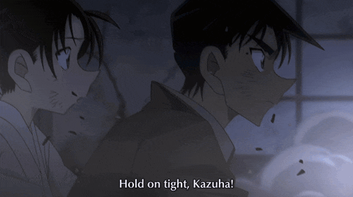 a couple of anime characters standing next to each other with the words hold on tight kazuha