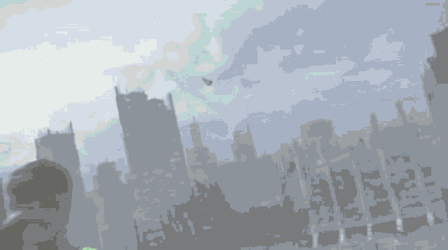 a man in a green superhero costume stands in front of a destroyed city