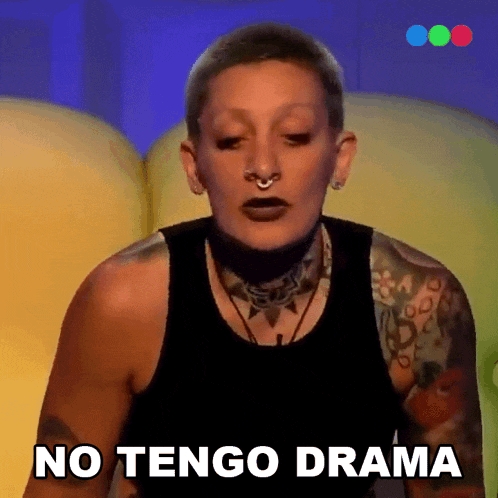 a woman with a tattoo on her arm says " no tengo drama "