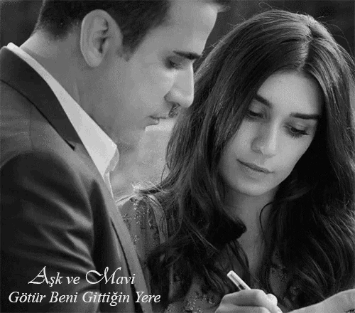 a black and white photo of a man and woman with the words aşk ve mavi