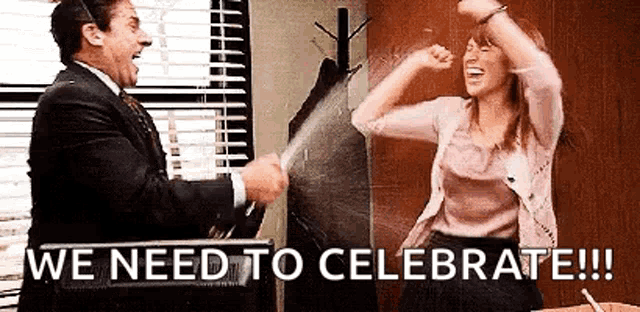 a man and a woman are celebrating in an office with the words `` we need to celebrate !!! '' .