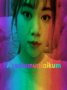 a woman 's face is surrounded by a rainbow and the words " assalamualaikum "