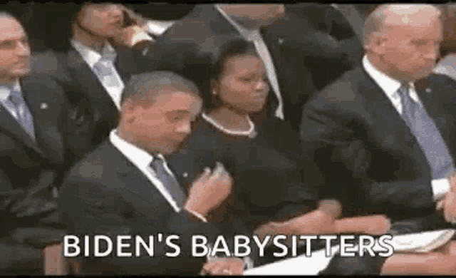 a group of people in suits and ties are sitting in a room with the words biden 's babysitters .