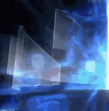 a blurry picture of a blue background with a watermark that says @thenextgif
