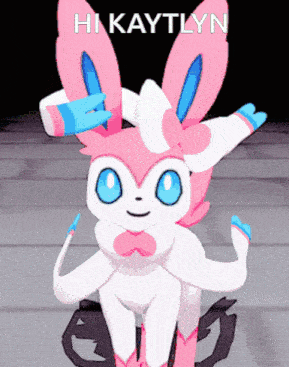 a pink and white cartoon bunny with blue eyes and the name hikaylyn