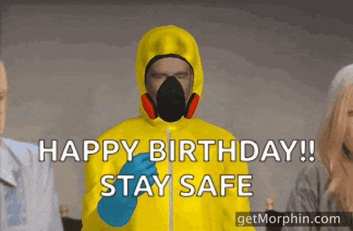 a man in a yellow hazmat suit says happy birthday