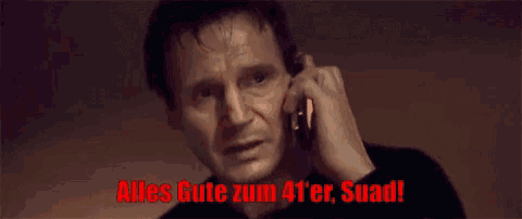 a man is talking on a cell phone with the words alles gute zum 4 ' er suad
