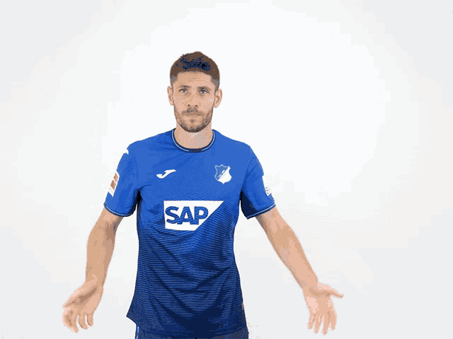 a man in a blue shirt that says sap on it