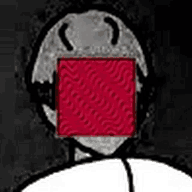 a person with a red square on their face .