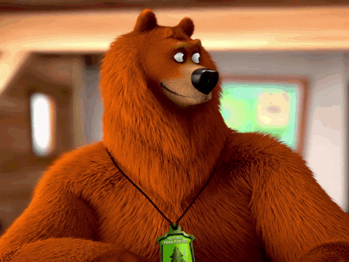 a bear wearing a necklace with a green pendant that says rain forest