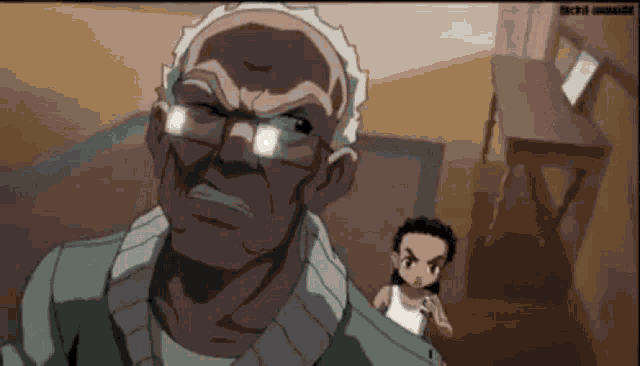 an elderly man with glasses is standing next to a young boy .