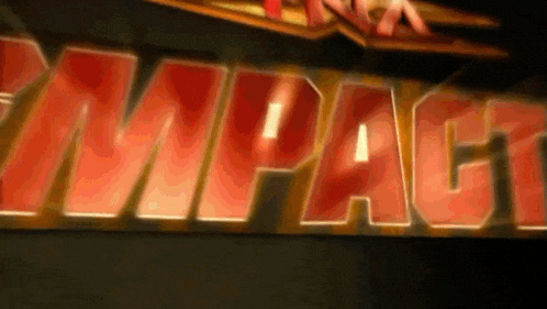 a sign that has the word impact in red letters