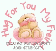 a teddy bear is sitting on a pink pillow and hugging itself .
