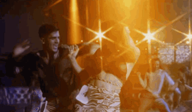 a man and a woman are dancing together in a club