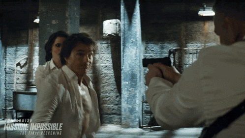 a movie poster for mission impossible the final reckoning shows a man holding a gun