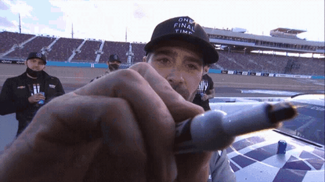 Signing Jimmie Johnson GIF