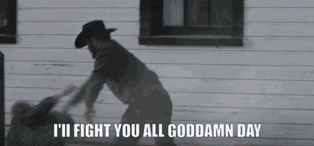 a man in a cowboy hat says " i 'll fight you all goddamn day " in front of a white building