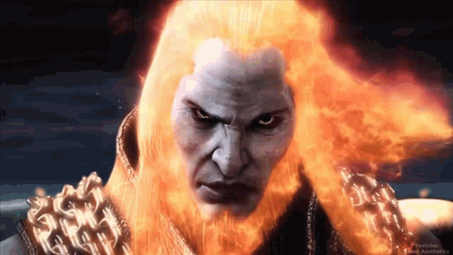 a close up of a man with fire coming out of his head