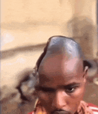 a man with a large bump on his head .