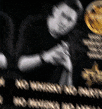 a blurred image of a man holding a microphone with the words no whiskey no whisky on the bottom right