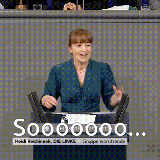 a woman stands behind a podium with the words heidi reichinek die linke written on the bottom
