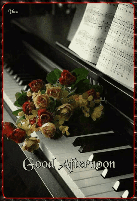 a good afternoon greeting card with flowers and music
