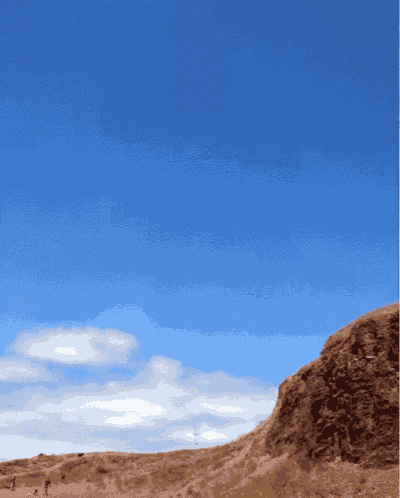 a blue sky with a few clouds in it