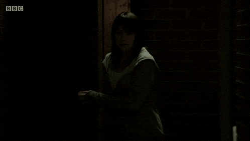 a blurry picture of a woman with bbc written on the bottom left